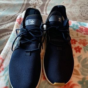 Brand new Men’s 7.5 Adidas Navy shoes